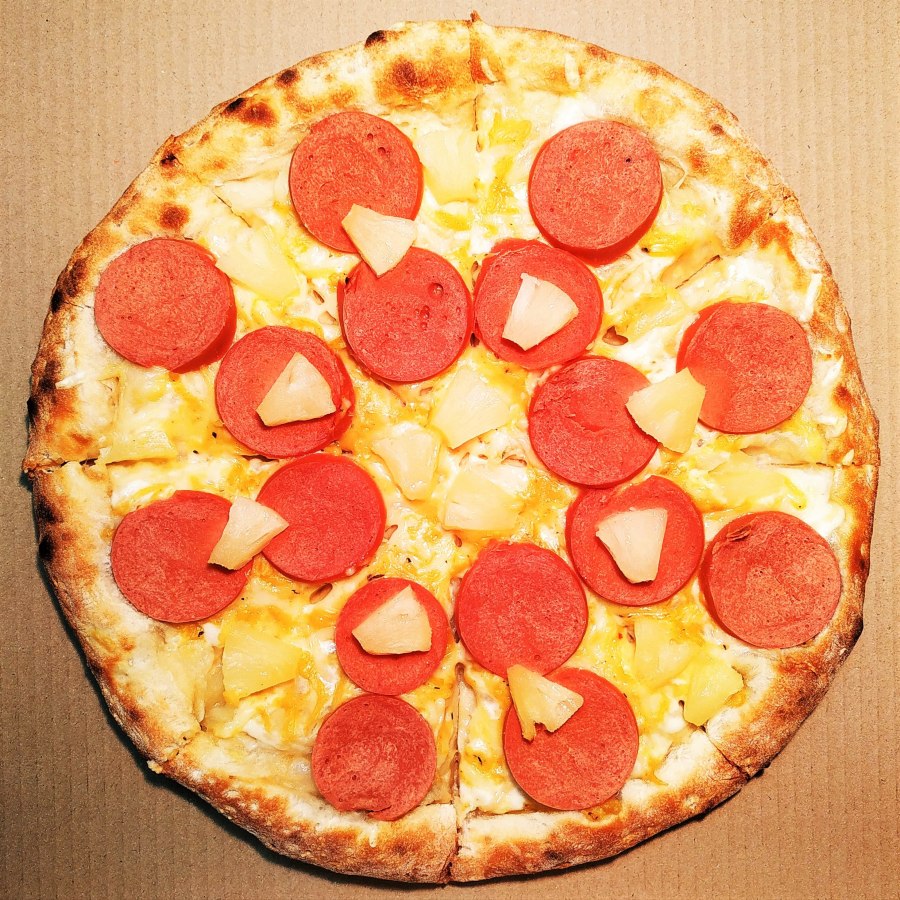 Еда пицца с ананасами