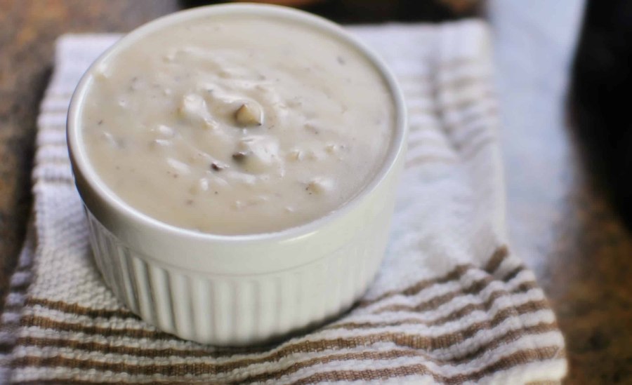 Шампиньоны в сливочном соусе с сыром